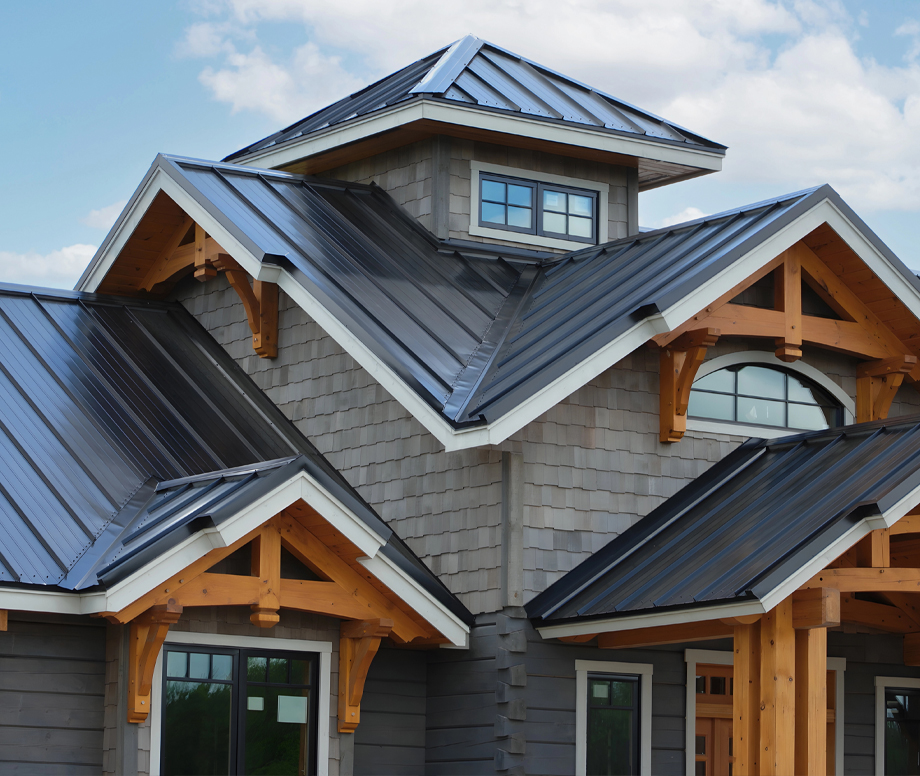 Home with a Metal Roof Across Multiple Gables Showing Roof Replacement Options for Moore and Norman, OK