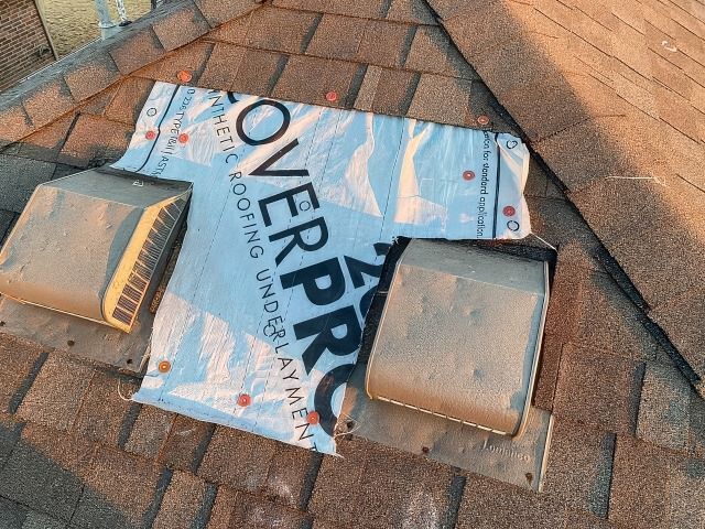 Roof Shingles and Underlayment Patching Around Two Vents Illustrating Shingle Roofing Repairs for Yukon and Moore, OK