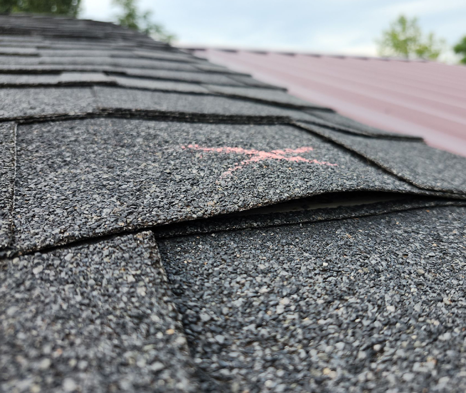 Chalk-Marked Asphalt Shingles Illustrating Roof Inspection Services for Moore and Midwest City, OK
